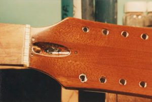 Repaired broken guitar headstock