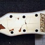 Damaged head plate of the vintage White Falcon