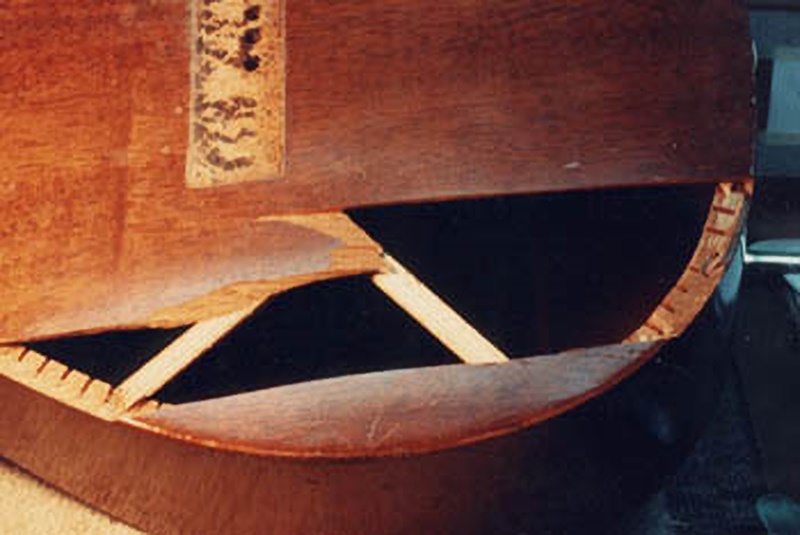 Broken mahogany top of Guild guitar