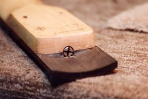 Curved ebony fretboard that consists of five pieces of ebony