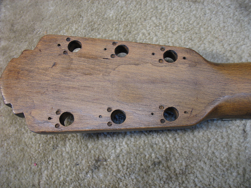 Extra machine head holes on the Coletti archtop guitar