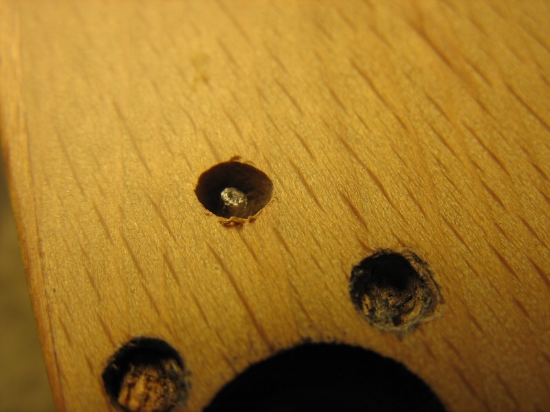 Removing the broken screw in the hole of the headstock