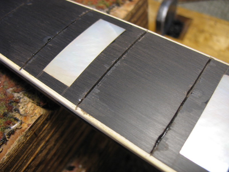 Removing frets of the vintage guitar
