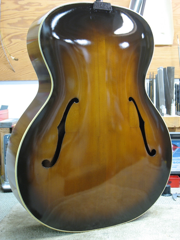 Repaired crack on the archtop guitar