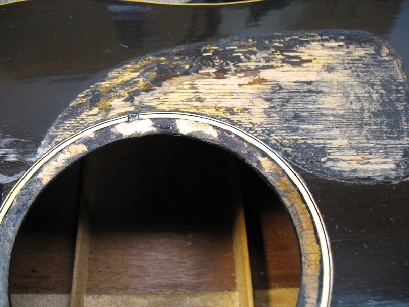 Damaged soundhole and rossette of vintage Gibson J35