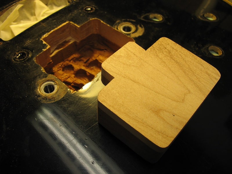 A wood block for filling the tremolo cavity