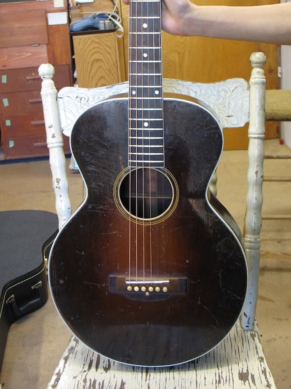 Restored parlor guitar